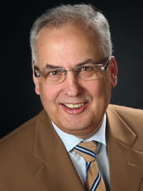Dr. Karl Schneider